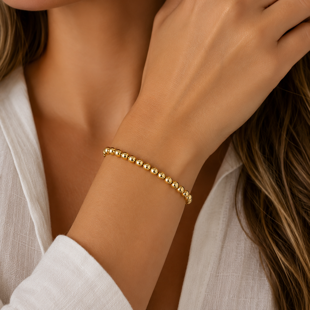 4mm 14k Gold Filled Karma waterproof bracelet: 7"