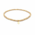 Luxe Cross Bracelet in CHAMPAGNE